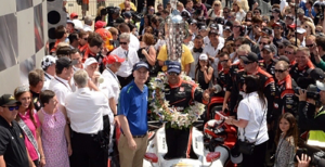 Standing beside the Borg-Warner Trophy in Victory Lane, BorgWarner President and CEO James Verrier congratulated Juan Pablo Montoya on his victory at the Indianapolis 500.