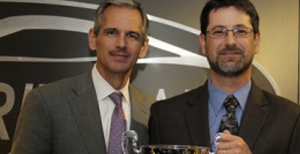 2014 Counter Professional of the Year recipient Russell Paroff (right) with Dan Askey, president of NAPA Auto Parts