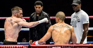 “Southpaw” lead character Billy Hope, played by Jake Gyllenhaal, takes to the ring to face an opponent in a light heavyweight championship fight. Photo Credit: Scott Garfield courtesy of The Weinstein Company