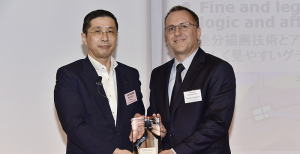 Nissan Motor Corp. presented the Global Innovation Award to Visteon Corp. in a July 14 ceremony in Yokohama, Japan. Hiroto Saikawa, chief competitive officer for Nissan (left), gives the award to Visteon’s Loick Griselain, vice president for the company’s Renault-Nissan customer group.
