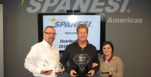 2015 Spanesi Americas Distributor of the Year Chad Neal (center) from Paint Works with Timothy Morgan and Cristina Spanesi.