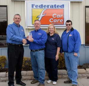  (L to R) – Phil Moore, Federated Auto Parts; Tim Smith and Kim Smith, owners, American & Import Auto Repair; and Kevin Andrade, Fisher Auto Parts.