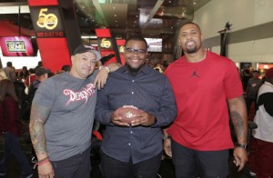 The NFL Network debuted new reality series "Tackle My Ride," starring Super Bowl Champion LaMarr Woodley, right, and Demented Customs master car builder, James Torrez, left, with featured Cleveland fan, Joe Whitthorne, Nov. 2 at 2016 SEMA Show in Las Vegas. 