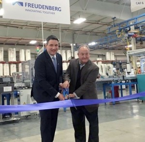 Dr. Erek Speckert, global vice president of operations and Barry Kellar, global vice president of automotive filter, at the opening ceremony of the new cabin air filter production line in Hopkinsville, Kentucky.