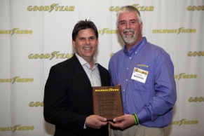 The 2012 Goodyear North America Highway Hero Award winner Jason Harte (right), with Gary Medalis, director of marketing, Goodyear Commercial Tire Systems. Harte rescued a family of six from a smashed minivan.