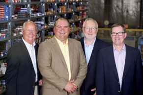 From left: John Bartlett, CEO of APH; Corey Bartlett, president of APH; Dick Beirne, president of United Auto Supply; and Jim Becker, operations manager at United Auto Supply.