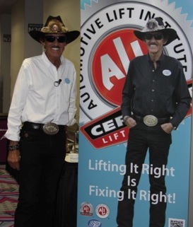 Richard “The King” Petty, seven-time NASCAR Champion, posed with one of the new ads promoting the ALI Lift Inspector Certification Program before making a surprise appearance at the program kick-off event at the SEMA Show in Las Vegas on Oct. 31.