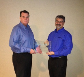 (Left to right) Roger Bird, National Sales Account Manager, and Dennis Samfilippo, General Manager, for Philips Automotive Lighting with Popular Mechanics Editor’s Choice Award.
