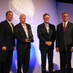From left: Mark Seng, vice president, Global Aftermarket Practice Leader, R. L. Polk & Co.; Joe Moore, director of purchasing, Performance Warehouse, Inc.; JR Moore, president of Warehouse Operations, Performance Warehouse Inc.; and Stephen Polk, chairman, president and CEO, R. L. Polk & Co. 