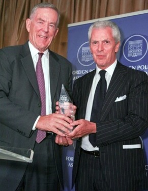 Pirelli Chairman and CEO Marco Tronchetti Provera (right) accepts the Foreign Policy Association's 2013 Social Responsibility Award.  
