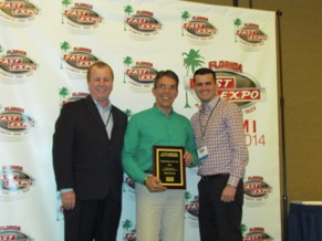 Centric Parts' Joe Evora (center) was named Rep of the Year by NPW. Centric also was honored as a Million Dollar Vendor.