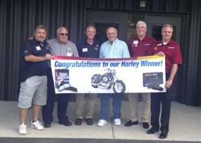  

Left to Right: Mike Miller, sales representative; Bob Hawk, VP sales and marketing; Keith Grasier, regional sales manager, all from Eastern Warehouse Distributors; Jeff Ireland, winner, and Joe Dunn, eastern division manager, Allan Foote, sales development manager, both from Federal-Mogul.