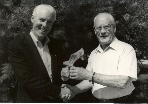 John N. Castle (right), James “Jim” John, chair of Automotive Aftermarket program.