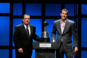 Michael Proud, director of marketing, North America, Federal-Mogul, (left) with winner Alan Gustafson.